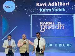 
      
      Ravi Adhikari receives Best Debut Director Award
      
      