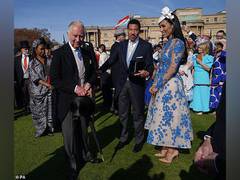 
      
      King Charles hosts singer Lionel Richie at garden party
      
      