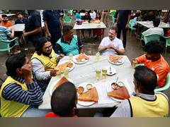 
      
      Rahul Gandhi relishes masala dosa with gig workers
      
      