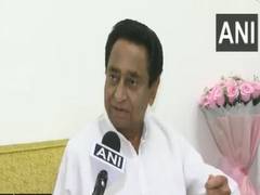 
      
      Eyeing MP polls, Congress announces monthly aid for women
      
      