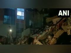
      
      Three storeyed building collapses in Gujarat's Ahmedabad
      
      