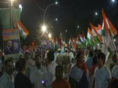 
      
      BJP workers gather outside Palam airport to welcome PM Modi
      
      