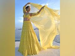 
      
      Surveen Chawla brings desi glam at Cannes in yellow lehenga
      
      