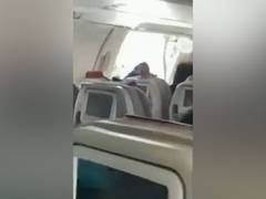 
      
      Passenger opens door of Asiana Airlines plane before landing
      
      