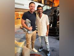
      
      Former RCB bowler Yuzvendra Chahal meets AB de Villiers
      
      