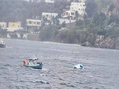 
      
      Tourist boat capsizes in Italy's Lake Maggiore, kills four
      
      