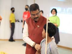 
      
      Dharmendra Pradhan meets students, teachers in Singapore
      
      