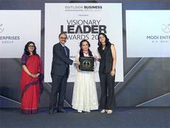 
      
      Bina Modi Honoured with 