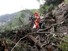 
      
      China mountain collapse: 14 killed, 5 missing in Sichuan province
      
      
