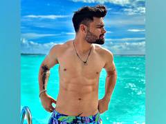 
      
      Rinku Singh raises temperature with his 'six pack' abs
      
      
