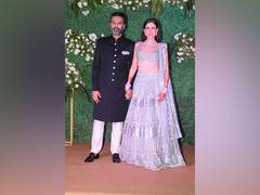 
      
      Sonnalli Seyggal, Ashesh beam with joy at wedding reception
      
      