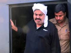 
      
      ED seizes cash, property documents after searches at Atiq's aides
      
      