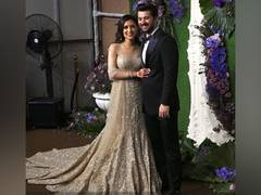 
      
      Newlyweds Karan-Drisha look charming at their reception
      
      