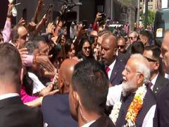 
      
      PM Modi meets people outside hotel in New York
      
      