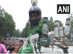 
      
      Ahead of Opposition meeting, RJD workers flaunt party symbol
      
      