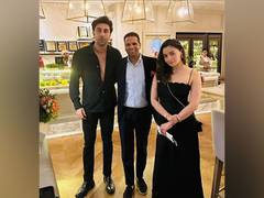 
      
      Ranbir, Alia twin in black outfits as they pose with fan in Dubai
      
      