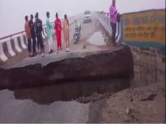 
      
      Approach road for bridge in UP washed away
      
      