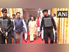 
      
      CM Yogi hands over flats for poor
      
      