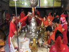 
      
      Devotees throng ancient Shiva Temple on Guru Purnima
      
      