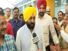 
      
      Punjab CM Mann hands over cheques to kin of cops who died 
      
      