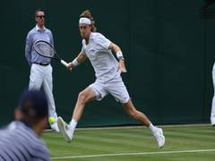 
      
      Wimbledon: Andrey Rublev downs Max Purcell to reach second round
      
      