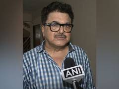 
      
      Ashoke Pandit speaks during special screening in JNU
      
      
