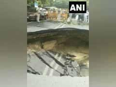 
      
      Road caves in at Delhi's Janakpuri area, holds up traffic
      
      