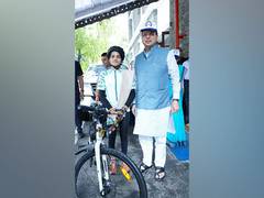 
      
      Uttarakhand CM Dhami meets cyclist Asha Malviya
      
      
