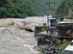 
      
      Heavy rains cause large-scale disruption, floods in North India
      
      