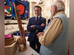 
      
      PM Modi gifts Sandalwood Sitar to French President 
      
      