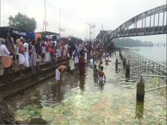 
      
      Devotees perform Karkidaka Vavu bali across Kerala
      
      