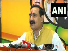 
      
      MP Home Minister Narottam Mishra
      
      