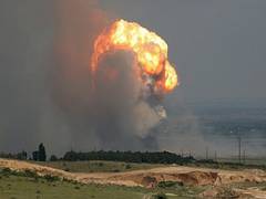 
      
      Putin briefed on explosions at ammunition dump in occupied Crimea
      
      
