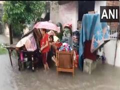 
      
      Rainwater enters houses, leaves roads inundated in Yavatmal
      
      
