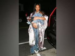 
      
      Pregnant Rihanna shows off baby bump at dinner with son RZA
      
      