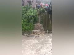 
      
      Sahatradhara River in spate due to constant downpours
      
      
