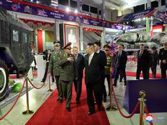 
      
      Kim Jong Un visited arms exhibition with Russian delegation
      
      