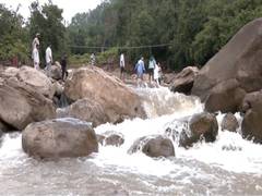 
      
      Footbridge swept away in heavy rains, scores affected
      
      