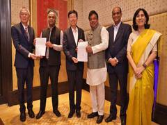 
      
      Karnataka, Foxconn sign Letter of Intent for two projects
      
      