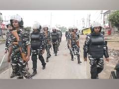 
      
      Haryana: Paramilitary forces conduct flag march in Nuh amid curfe
      
      