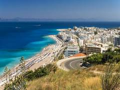 
      
      Greece PM offers free Rhodes vacation for travellers 
      
      