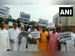 
      
      BJP MPs hold 'Quit India' protest on Parliament premises
      
      