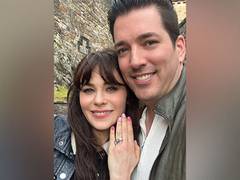 
      
      Jonathan Scott, Zooey Deschanel engaged
      
      
