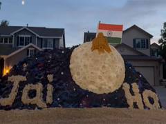 
      
      Sand artist creates sand sculpture of India's moon mission
      
      