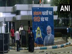
      
      Posters put up near Palam Airport to welcome PM Modi
      
      