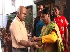 
      
       Raksha Bandhan: Sex workers in Sonagachi tie Rakhi to passers-by
      
      