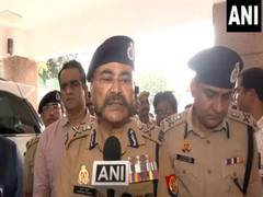 
      
      UP Special DG Prashant Kumar meets injured woman  
      
      