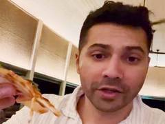
      
      Varun Dhawan enjoys pizza on his cheat day
      
      
