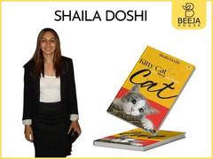 
      
      Kitty Cat with Shaila Doshi’s debut book, published by Beeja
      
      