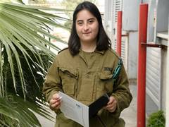 
      
      Israeli soldier with Down’s syndrome bids farewell to her uniform
      
      